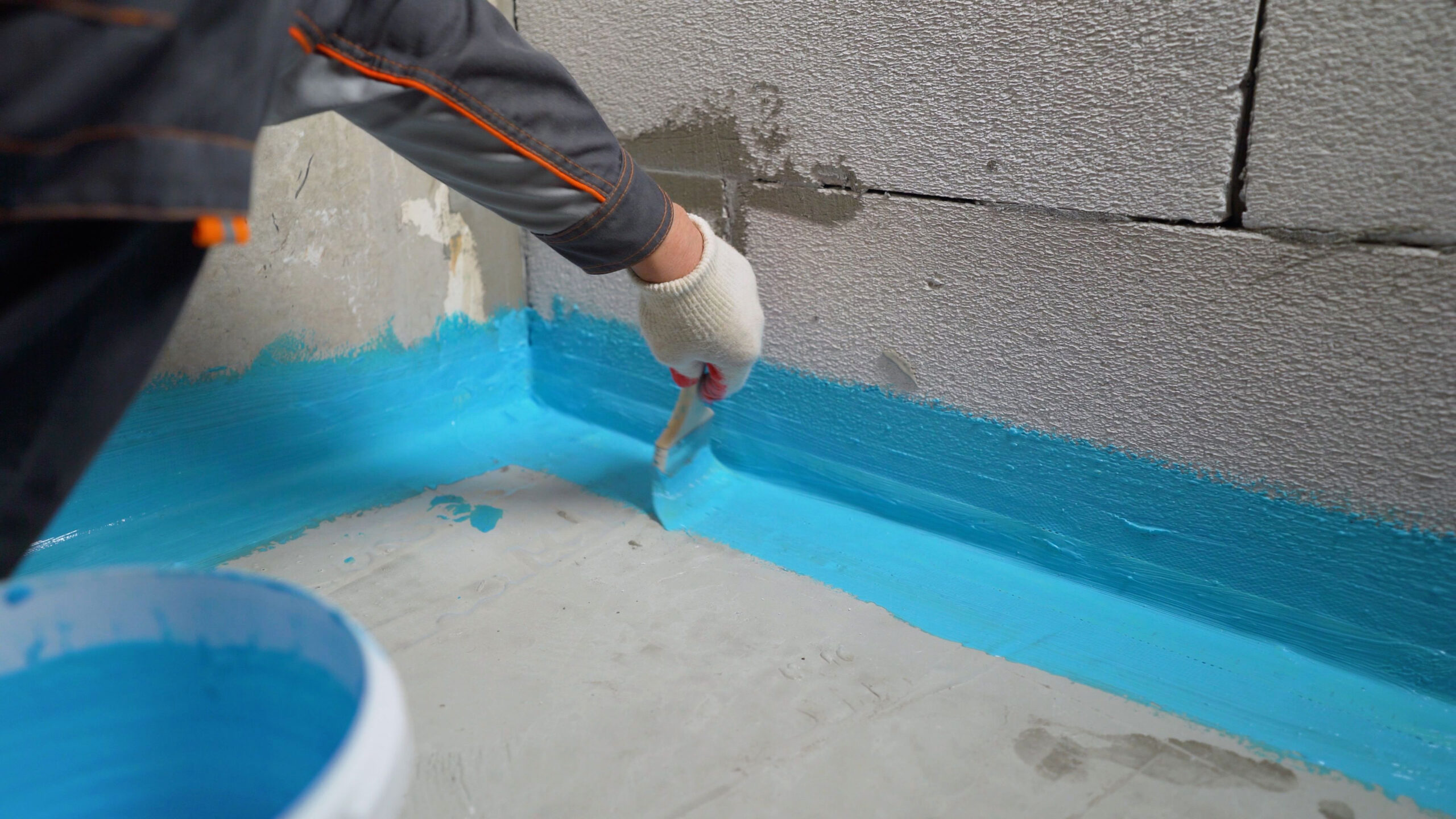 Applying cement polymer to basement